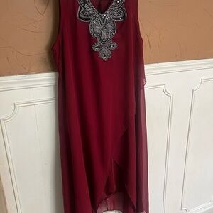 Elegant Burgundy Sleeveless Dress with Embellished Neckline